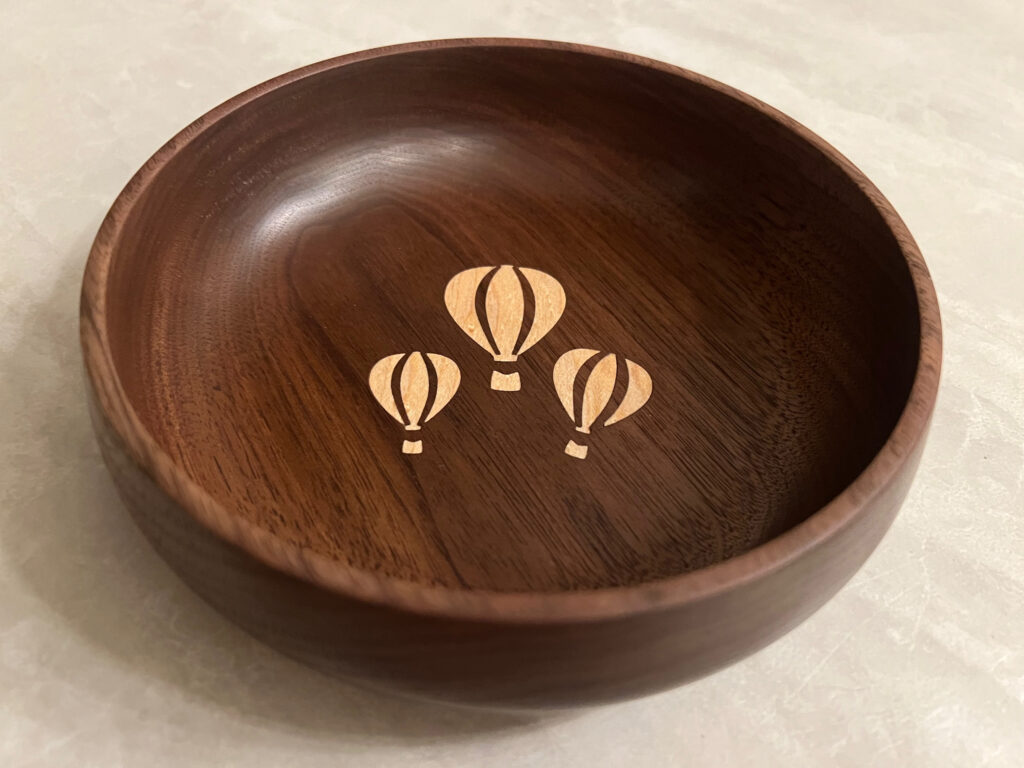 Turned Walnut Bowl with Balloon Inlay Design
